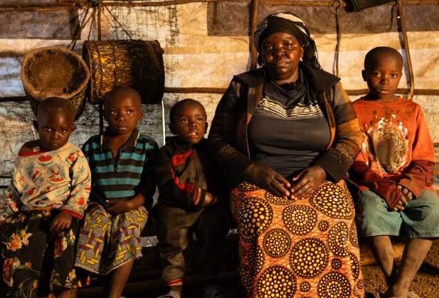 Displaced voices: Fela Mbahibwe escapes violence with her children on her back