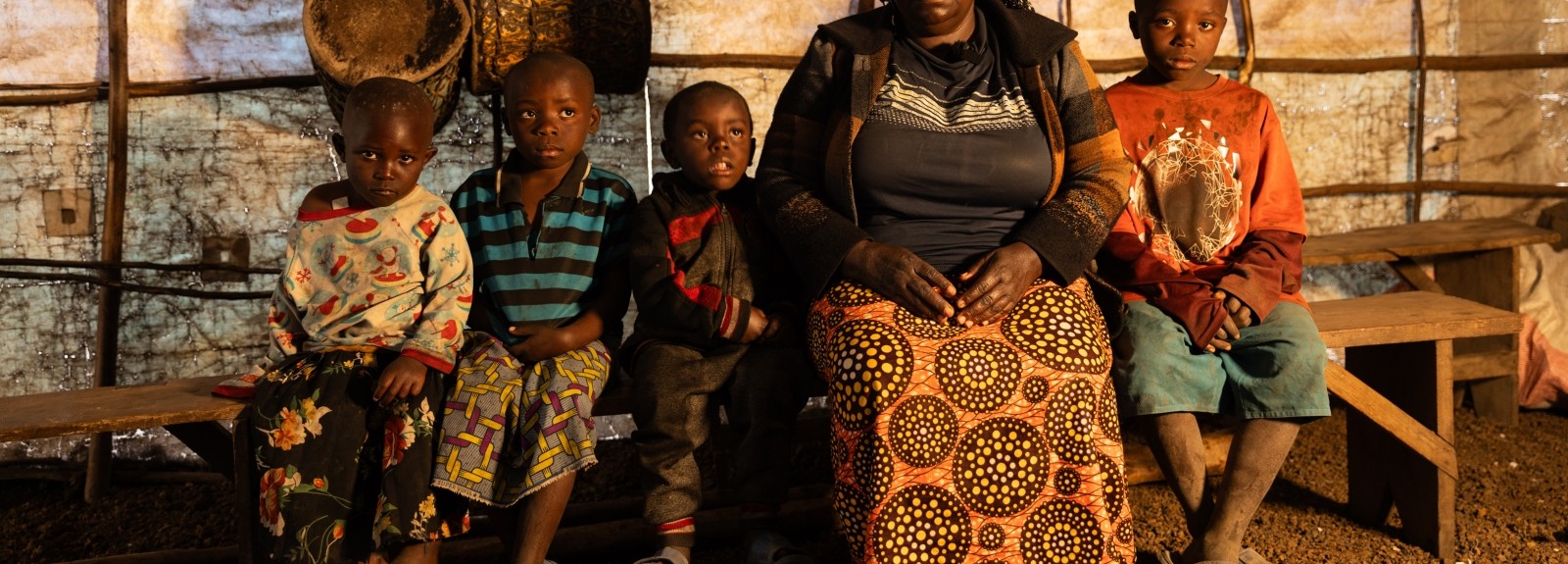 Displaced voices: Fela Mbahibwe escapes violence with her children on her back