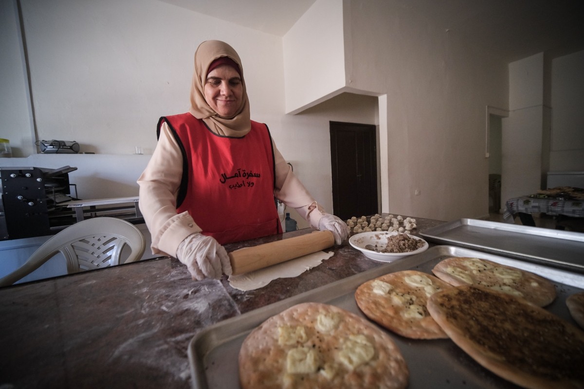 A Lebanese women entrepreneur works in her kitchen